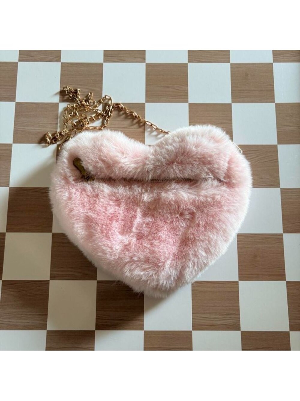 Pink heart shaped faux fur purse